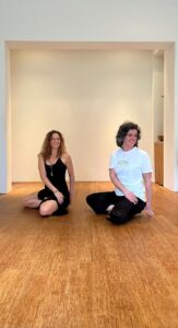 Judith & Cuny doing a seated twist