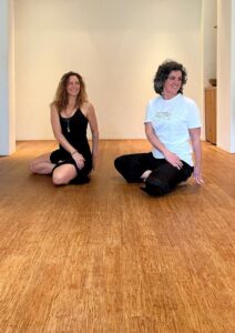 Judith & Cuny doing a seated twist